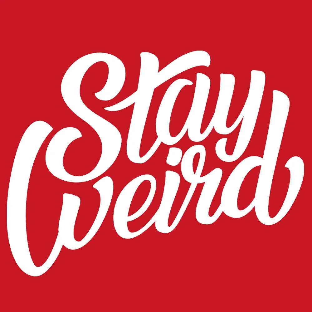 Stay Weird Tee | Red